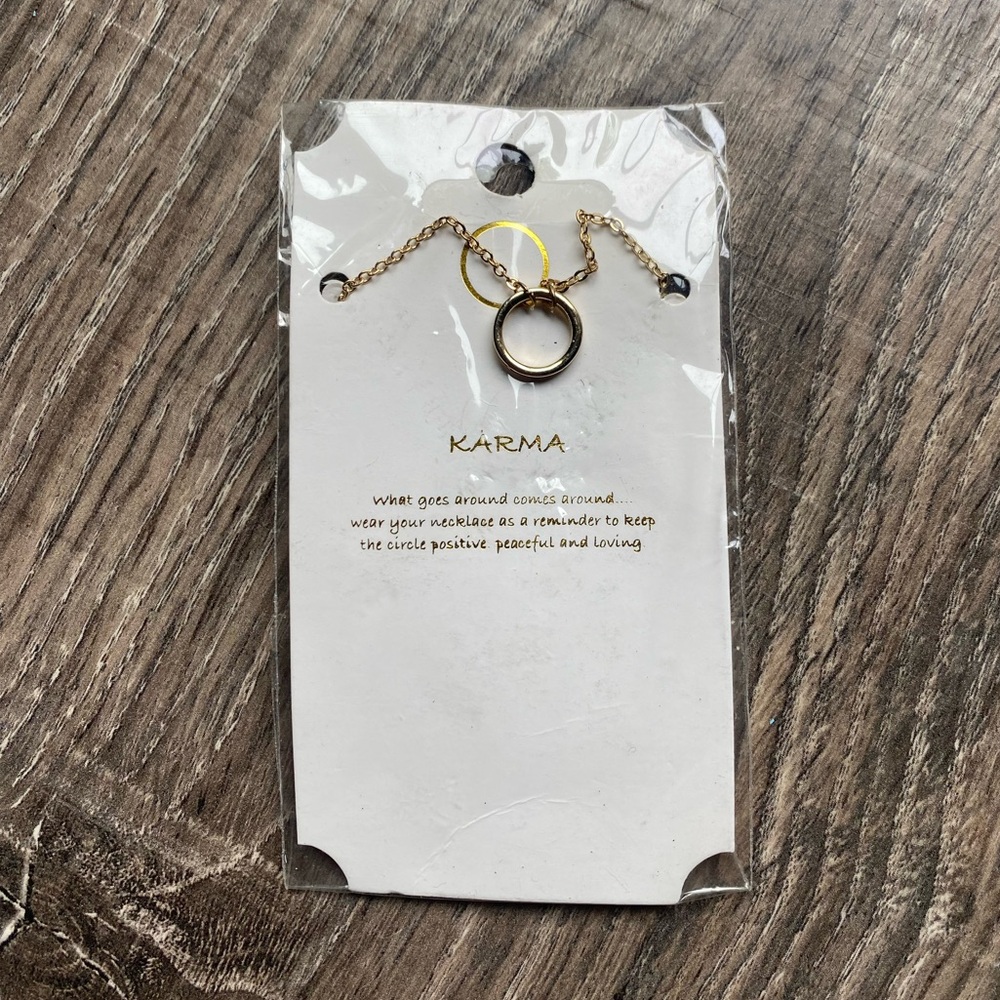 Gold toned Karma circle necklace NWT